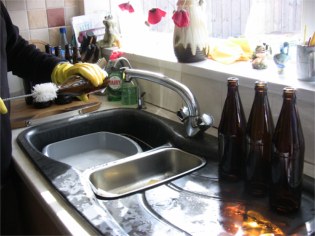 washing out beer bottles