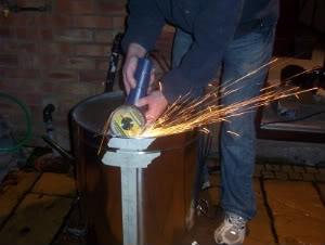 grinding skin from mash tun base with angle grinder 2