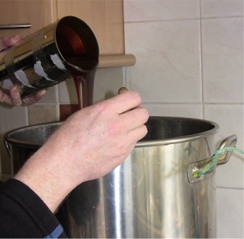 pouring malt extract into boiler